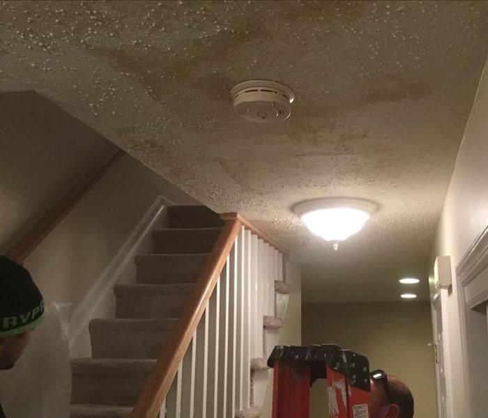Water coming through ceiling of a dining room